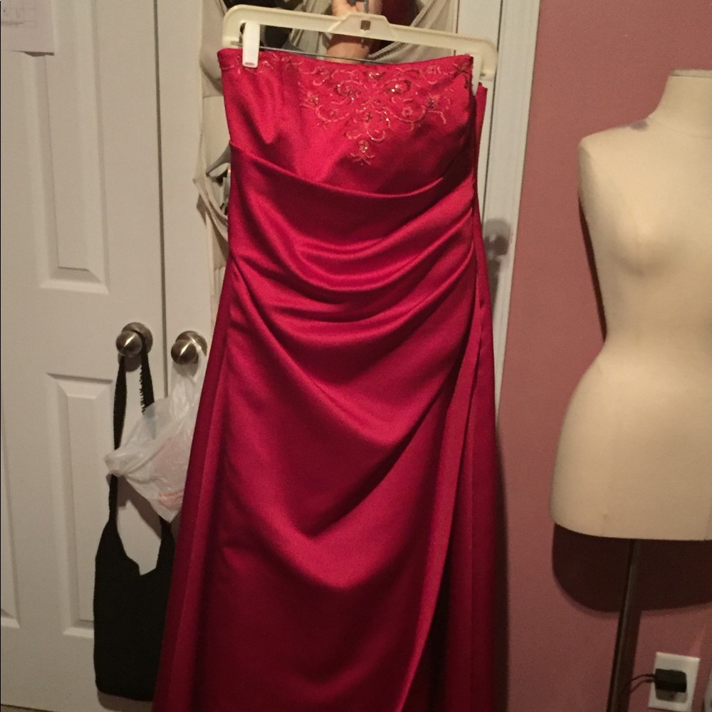 A Davids Bridal red strapless prom dress